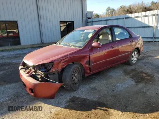 2004 Kia Spectra LX with VIN KNAFE121345025861, listed as a Copart auction lot 46936205 with 258,299 mi miles and Salvage Title. Bid and sale history available at carsss.com. Image 1.