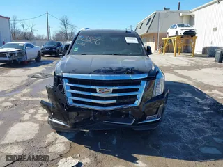 2017 Cadillac Escalade Premium Luxury with VIN 1GYS4CKJXHR133970, listed as a IAAI auction lot 41666038 with 100,269 mi miles. Bid and sale history available at carsss.com. Image 12.