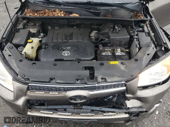 2011 Toyota RAV4 Ltd with VIN 2T3DK4DV8BW053374, listed as a Copart auction lot 52099575 with 115,677 mi miles and Salvage Title. Bid and sale history available at carsss.com. Image 14.