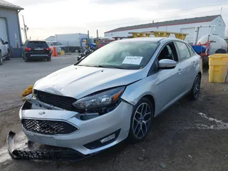 2017 Ford Focus SEL with VIN 1FADP3H23HL221712, listed as a IAAI auction lot 41823077 with 51,233 mi miles. Bid and sale history available at carsss.com. Image 2.