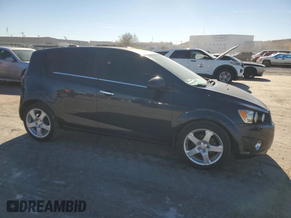 2016 Chevrolet Sonic LTZ z VIN 1G1JE6SB0G4135806, wystawiony jako Copart lot #81431844 z przebiegiem 126 908 mil mil oraz Czysty tytuł • Clean title. Historia ofert i sprzedaży dostępna na DreamBid. Obrazek 4.