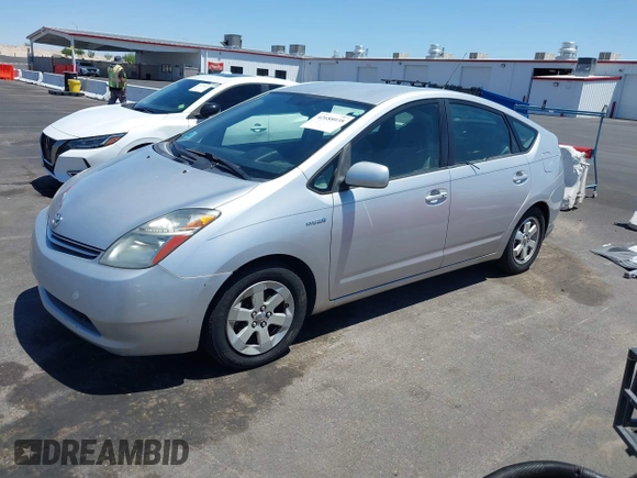 2007 Toyota Prius with VIN JTDKB20U977090140, listed as a IAAI auction lot 42688038 with 198,665 mi miles and . Bid and sale history available at DreamBid. Image 2.