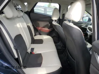 2017 Mazda CX-3 Grand Touring z VIN JM1DKFD75H0141048, wystawiony jako Copart lot #55752185 z przebiegiem 89 960 mil mil oraz Szkody całkowita. Historia ofert i sprzedaży dostępna na DreamBid. Obrazek 11.