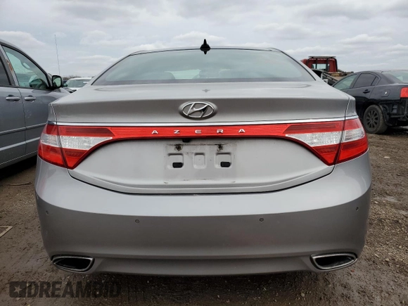 2012 Hyundai Azera с VIN KMHFH4JG1CA186454, выставлен на аукционе Copart как лот 51685695 с пробегом 123 327 миль миль и Списание • Salvage title. История ставок и продаж доступна на DreamBid. Изображение 6.