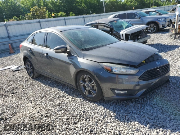 2016 Ford Focus SE with VIN 1FADP3FE8GL381855, listed as a Copart auction lot 57366645 with 104,709 mi miles and Salvage title. Bid and sale history available at DreamBid. Image 4.