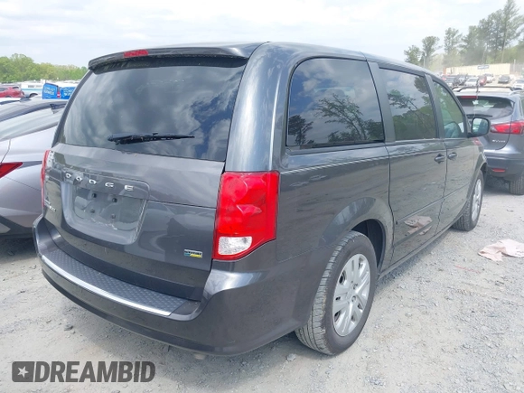 2016 Dodge Grand Caravan SE with VIN 2C4RDGBG2GR345965, listed as a IAAI auction lot 41955192 with 141,531 mi miles and . Bid and sale history available at DreamBid. Image 4.