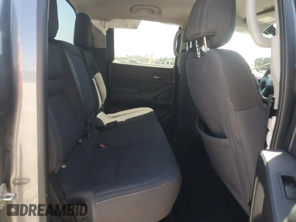 2023 Nissan Frontier SV with VIN 1N6ED1EJ9PN662851, listed as a Copart auction lot 52243205 with 48,708 mi miles and Salvage title. Bid and sale history available at DreamBid. Image 11.