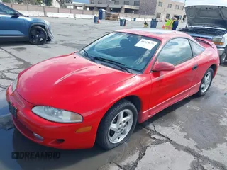 1996 Mitsubishi Eclipse with VIN 4A3AK44Y3TE293273, listed as a IAAI auction lot 41914675 with 153,928 mi miles and . Bid and sale history available at DreamBid. Image 6.
