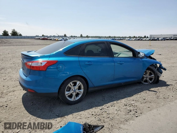 2012 Ford Focus SE with VIN 1FAHP3F22CL468085, listed as a Copart auction lot 61263665 with Not provided miles and Salvage title. Bid and sale history available at DreamBid. Image 3.