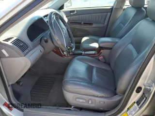 2006 Toyota Camry LE z VIN 4T1BF30KX6U630387, wystawiony jako Copart lot #49624755 z przebiegiem 232 568 mil mil oraz Szkoda całkowita • Salvage title. Historia ofert i sprzedaży dostępna na DreamBid. Obrazek 7.