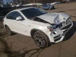 2015 BMW X4 xDrive28i with VIN 5UXXW3C59F0F89503, listed as a Copart auction lot 44500354 with 141,431 mi miles. Bid and sale history available at carsss.com. Image 4.
