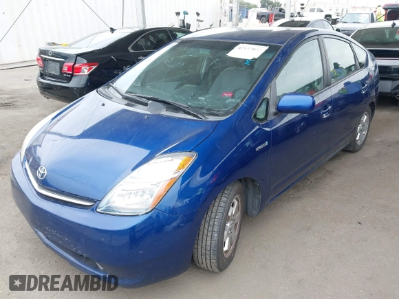 2009 Toyota Prius with VIN JTDKB20U797839844, listed as a IAAI auction lot 42117077 with 233,113 mi miles. Bid and sale history available at carsss.com. Image 2.