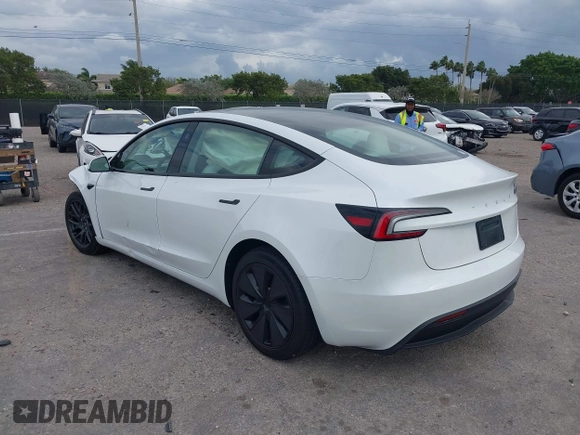 2025 Tesla Model 3 Long Range with VIN 5YJ3E1EA0SF932385, listed as a IAAI auction lot 41772613 with 1,683 mi miles and . Bid and sale history available at carsss.com. Image 3.