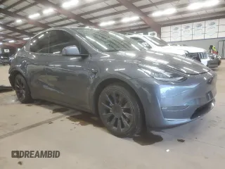 2021 Tesla Model Y Long Range with VIN 5YJYGDEE0MF076660, listed as a Copart auction lot 55957365 with 80,432 mi miles and Salvage Title. Bid and sale history available at DreamBid. Image 4.