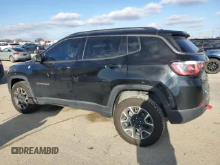 2020 Jeep Compass Trailhawk with VIN 3C4NJDDBXLT196297, listed as a Copart auction lot 87486584 with 108,766 mi miles and Salvage Title. Bid and sale history available at carsss.com. Image 2.