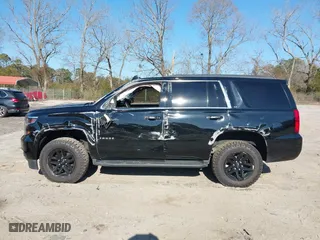 2019 Chevrolet Tahoe LT with VIN 1GNSKBKC3KR345776, listed as a IAAI auction lot 41674948 with 119,871 mi miles. Bid and sale history available at carsss.com. Image 14.