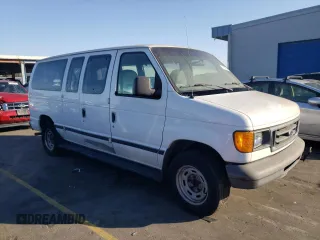 2004 Ford Econoline Passenger XL with VIN 1FMRE11W84HA50164, listed as a Copart auction lot 73438464 with 148,916 mi miles and Clean Title. Bid and sale history available at DreamBid. Image 4.