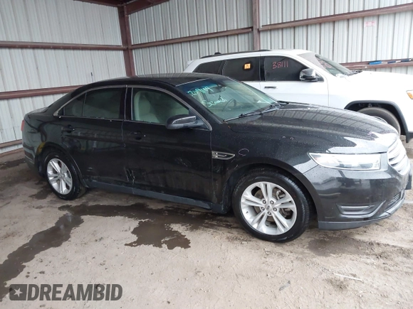 2015 Ford Taurus SEL z VIN 1FAHP2E87FG203272, wystawiony jako IAAI lot #41717231 z przebiegiem 95 829 mil mil oraz . Historia ofert i sprzedaży dostępna na DreamBid. Obrazek 13.