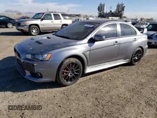 2015 Mitsubishi Lancer Evolution Final Edition z VIN JA32W7FV5FU028542, wystawiony jako Copart lot #67491522 z przebiegiem 83 173 mil mil oraz . Historia ofert i sprzedaży dostępna na DreamBid. Obrazek 1.