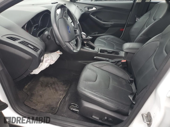 2016 Ford Focus SE z VIN 1FADP3F2XGL223796, wystawiony jako Copart lot #52567505 z przebiegiem Nie podano mil oraz Szkoda całkowita • Salvage title. Historia ofert i sprzedaży dostępna na DreamBid. Obrazek 7.
