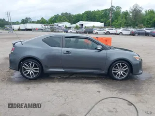 2015 Scion tC z VIN JTKJF5C75F3089895, wystawiony jako IAAI lot #42226465 z przebiegiem 106 694 mil mil oraz . Historia ofert i sprzedaży dostępna na DreamBid. Obrazek 13.