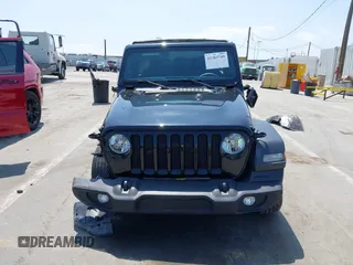 2023 Jeep Wrangler Willys with VIN 1C4HJXDG5PW615358, listed as a IAAI auction lot 42383749 with 31,988 mi miles and . Bid and sale history available at DreamBid. Image 13.