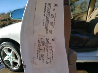 2000 Pontiac Bonneville SE z VIN 1G2HX54K2Y4241848, wystawiony jako Copart lot #80999434 z przebiegiem Nie podano mil oraz Szkoda całkowita • Salvage title. Historia ofert i sprzedaży dostępna na DreamBid. Obrazek 13.