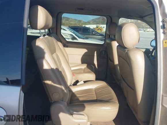2002 Kia Sedona LX with VIN KNDUP131326280553, listed as a IAAI auction lot 41831101 with 342,242 mi miles. Bid and sale history available at carsss.com. Image 8.