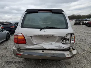 1999 Toyota Land Cruiser z VIN JT3HT05J6X0064313, wystawiony jako Copart lot #49555315 z przebiegiem 177 814 mil mil oraz Szkoda całkowita • Salvage title. Historia ofert i sprzedaży dostępna na DreamBid. Obrazek 6.