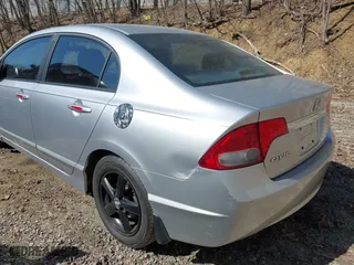 2010 Honda Civic Sdn EX with VIN 19XFA1F84AE035594, listed as a IAAI auction lot 41752445 with 173,264 mi miles. Bid and sale history available at carsss.com. Image 16.