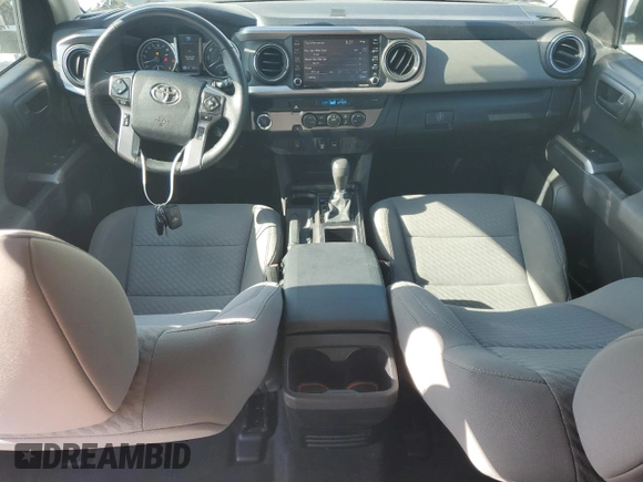 2023 Toyota Tacoma SR5 z VIN 3TMAZ5CN3PM212056, wystawiony jako Copart lot #57217735 z przebiegiem 36 533 mil mil oraz Szkoda całkowita • Salvage title. Historia ofert i sprzedaży dostępna na DreamBid. Obrazek 8.