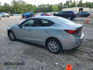 2014 Mazda 3 i Touring with VIN JM1BM1V75E1146162, listed as a Copart auction lot 63657205 with 117,840 mi miles and Salvage title. Bid and sale history available at DreamBid. Image 2.