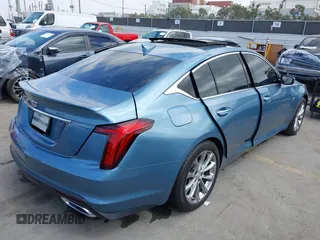 2024 Cadillac CT5 Premium Luxury z VIN 1G6DN5RK3R0110352, wystawiony jako IAAI lot #41885792 z przebiegiem 13 663 mil mil oraz . Historia ofert i sprzedaży dostępna na DreamBid. Obrazek 4.