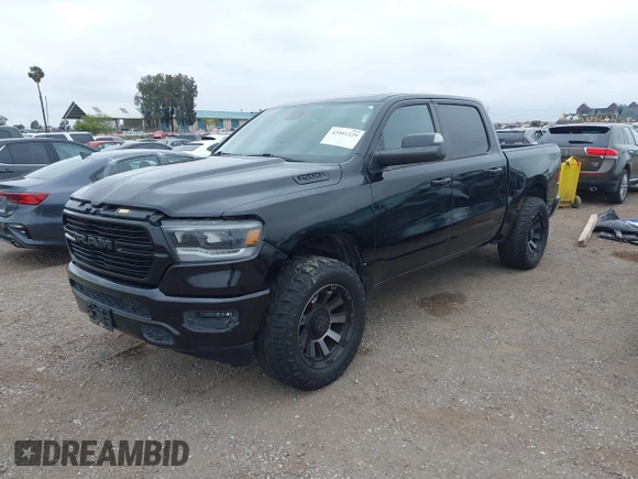2019 Ram 1500 Big Horn z VIN 1C6RREFT4KN769609, wystawiony jako IAAI lot #42401229 z przebiegiem 46 049 mil mil oraz . Historia ofert i sprzedaży dostępna na DreamBid. Obrazek 18.