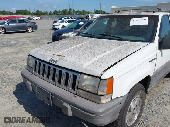 1994 Jeep Grand Cherokee Laredo with VIN 1J4GZ58S6RC295621, listed as a IAAI auction lot 42751869 with 370,230 mi miles and . Bid and sale history available at DreamBid. Image 6.