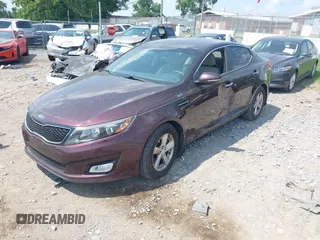 2015 Kia Optima LX with VIN 5XXGM4A70FG478819, listed as a IAAI auction lot 42571214 with 130,707 mi miles and . Bid and sale history available at DreamBid. Image 2.