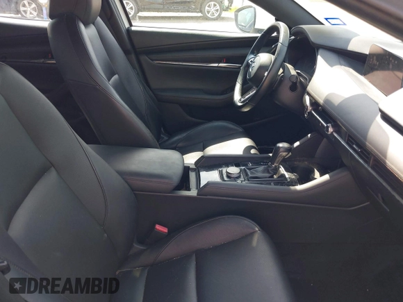 2021 Mazda 3 Premium z VIN JM1BPAML5M1402899, wystawiony jako IAAI lot #42252886 z przebiegiem Nie podano mil oraz . Historia ofert i sprzedaży dostępna na DreamBid. Obrazek 5.