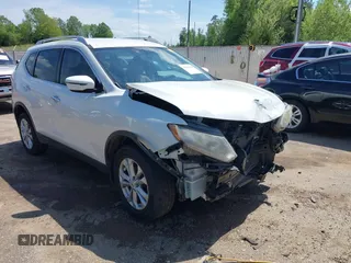 2016 Nissan Rogue SV with VIN KNMAT2MT2GP633600, listed as a IAAI auction lot 39191100 with 128,051 mi miles and . Bid and sale history available at DreamBid. Image 1.