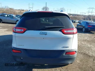 2015 Jeep Cherokee Latitude with VIN 1C4PJMCB3FW734573, listed as a IAAI auction lot 41825561 with 141,250 mi miles. Bid and sale history available at carsss.com. Image 17.
