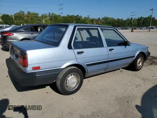 1987 Toyota Corolla с VIN JT2AE82E4H3494699, выставлен на аукционе Copart как лот 66815714 с пробегом 145 679 миль миль и Списание • Salvage title. История ставок и продаж доступна на DreamBid. Изображение 3.