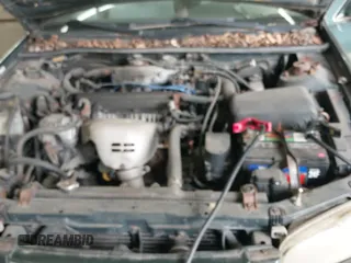 1999 Toyota Camry LE z VIN 4T1BG22KXXU900658, wystawiony jako IAAI lot #43390481 z przebiegiem 268 548 mil mil oraz . Historia ofert i sprzedaży dostępna na DreamBid. Obrazek 13.