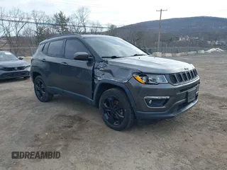 2019 Jeep Compass Latitude with VIN 3C4NJDBB4KT593022, listed as a IAAI auction lot 41627841 with 69,443 mi miles and . Bid and sale history available at DreamBid. Image 6.