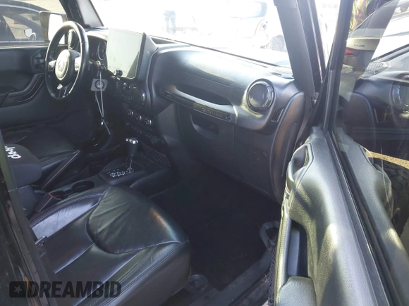 2017 Jeep Wrangler Unlimited Sahara with VIN 1C4BJWEG5HL635319, listed as a IAAI auction lot 42224748 with 141,214 mi miles and . Bid and sale history available at DreamBid. Image 5.