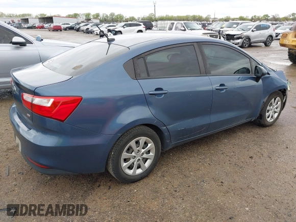 2016 Kia Rio LX with VIN KNADM4A38G6688646, listed as a IAAI auction lot 41904765 with 99,780 mi miles and . Bid and sale history available at DreamBid. Image 4.