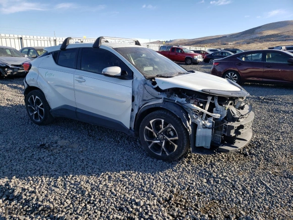 2019 Toyota C-HR XLE with VIN JTNKHMBX0K1014640, listed as a Copart auction lot 42634735 with 67,333 mi miles and Salvage Title. Bid and sale history available at carsss.com. Image 4.