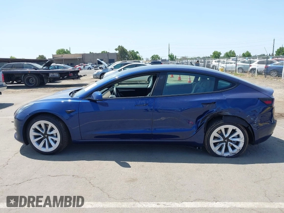 2023 Tesla Model 3 z VIN 5YJ3E1EA6PF547209, wystawiony jako IAAI lot #42511077 z przebiegiem 6 125 mil mil oraz . Historia ofert i sprzedaży dostępna na DreamBid. Obrazek 14.
