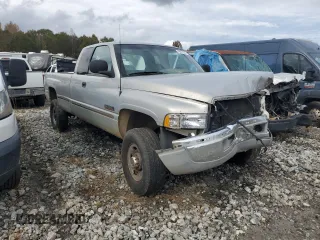 1999 Dodge Ram 2500 with VIN 1B7KF2363XJ519664, listed as a Copart auction lot 79477244 with 415,712 mi miles and Salvage Title. Bid and sale history available at carsss.com. Image 4.