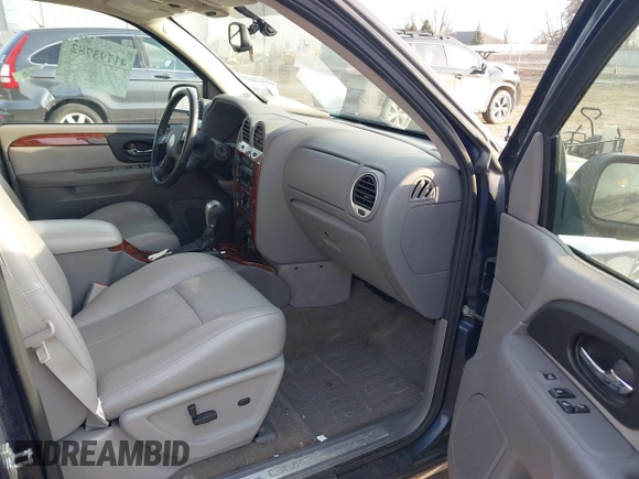 2008 GMC Envoy SLE2 with VIN 1GKDT13S082236289, listed as a IAAI auction lot 41793782 with 197,472 mi miles. Bid and sale history available at carsss.com. Image 5.