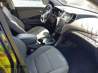 2014 Hyundai Santa Fe with VIN 5XYZUDLB9EG187420, listed as a IAAI auction lot 42369989 with 181,713 mi miles and . Bid and sale history available at DreamBid. Image 5.
