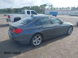 2015 BMW 3 Series 328i with VIN WBA3A5G59FNS85458, listed as a IAAI auction lot 42438242 with 133,483 mi miles and . Bid and sale history available at DreamBid. Image 4.